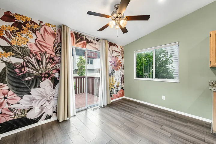 Vaulted ceiling with a ceiling fan and recessed lighting