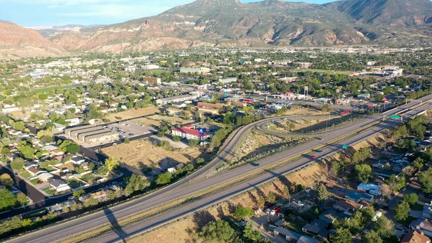 Expansive aerial view showcasing a developed area with extensive road infrastructure