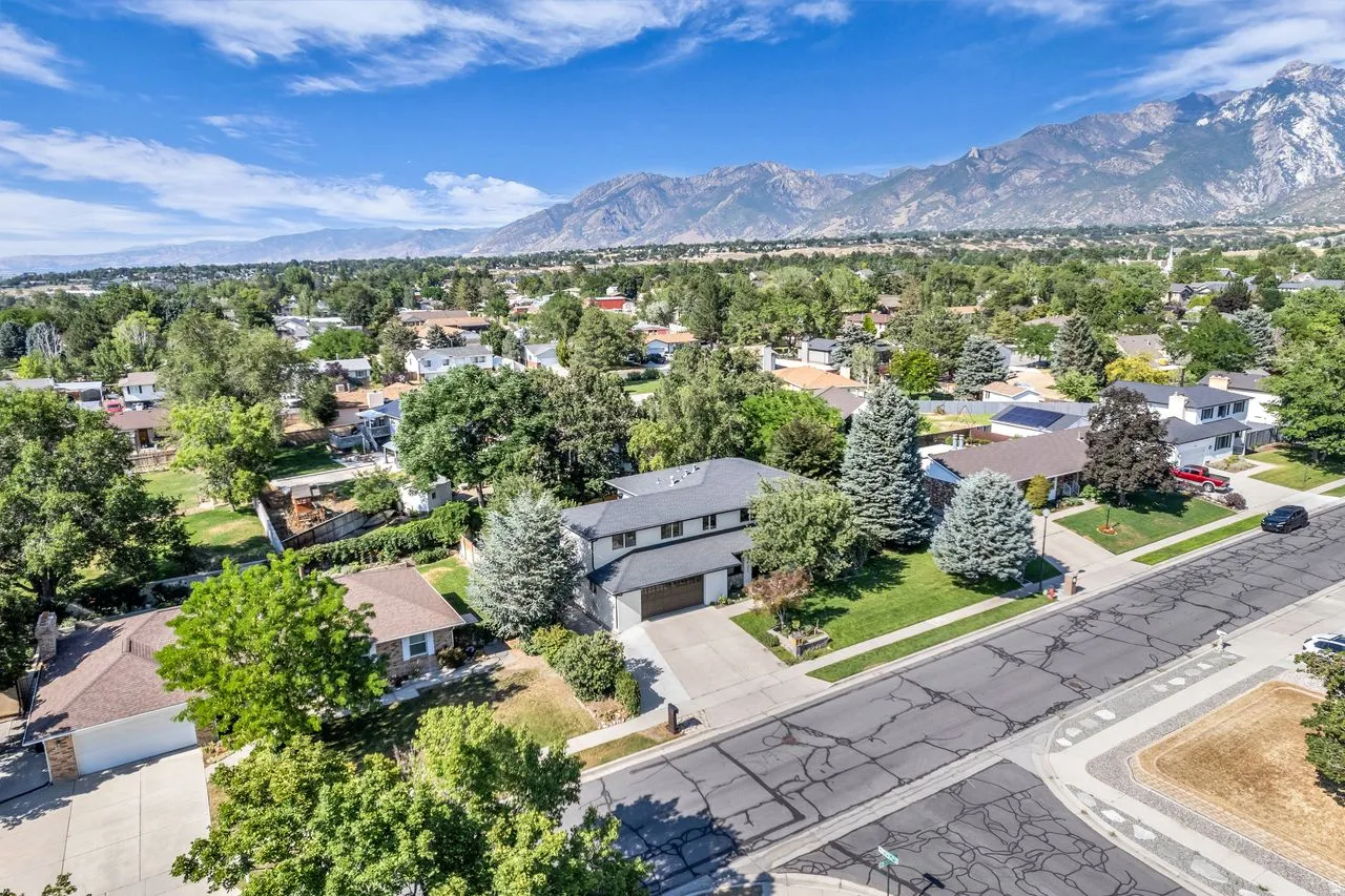 Residential neighborhood with established landscaping including mature trees
