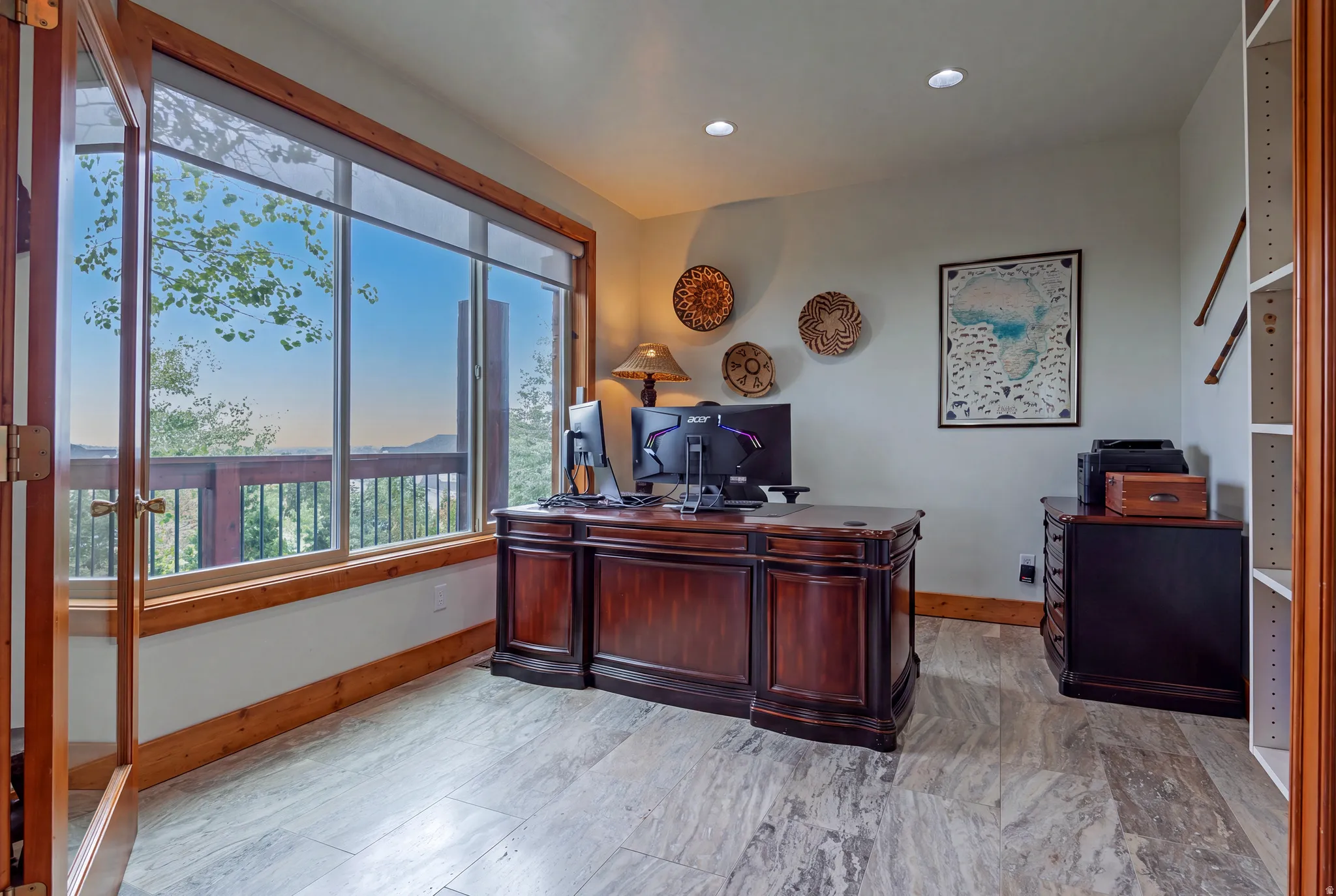 Expansive window wall with mountain scenery