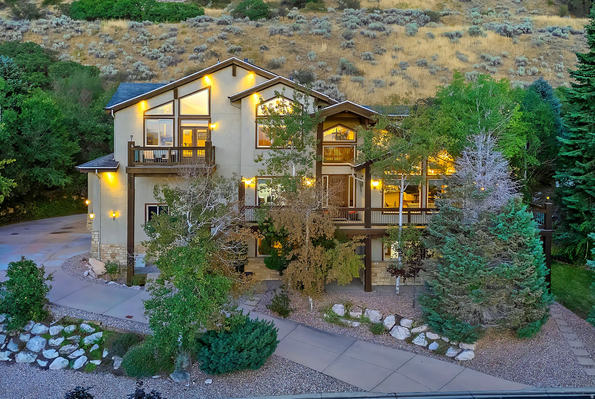 Multi-level stucco exterior with stone accents