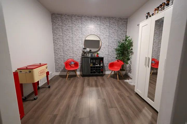 Accent wall featuring a white brick pattern