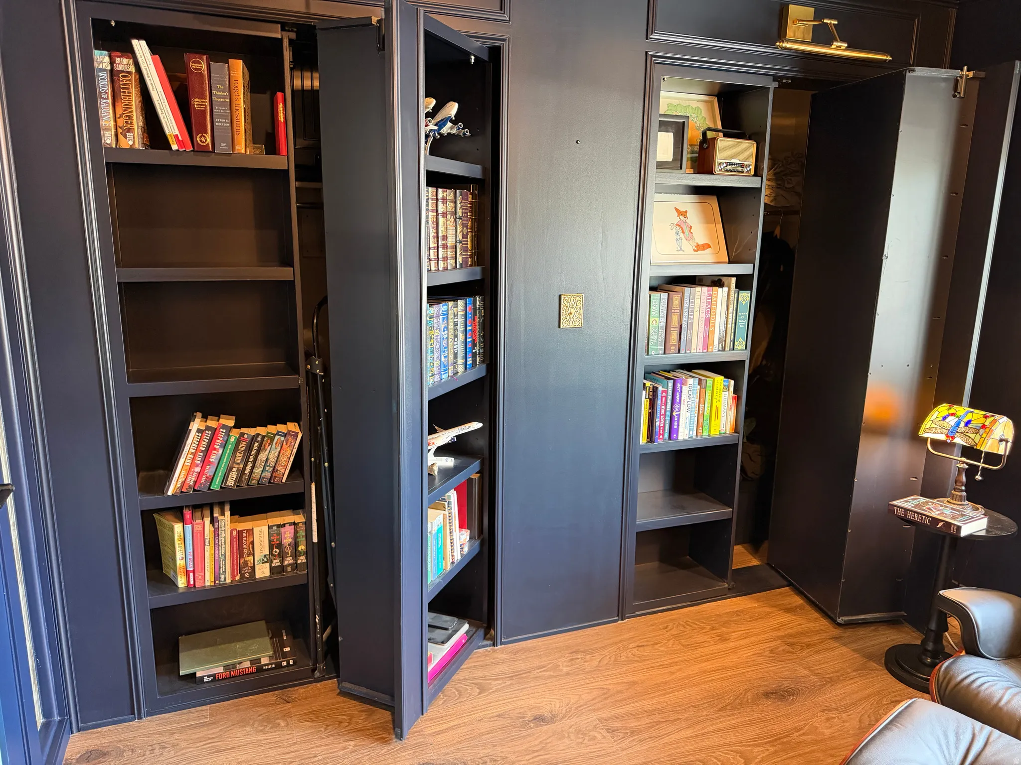 Upstairs Office Hidden Storage Behind Bookshelves