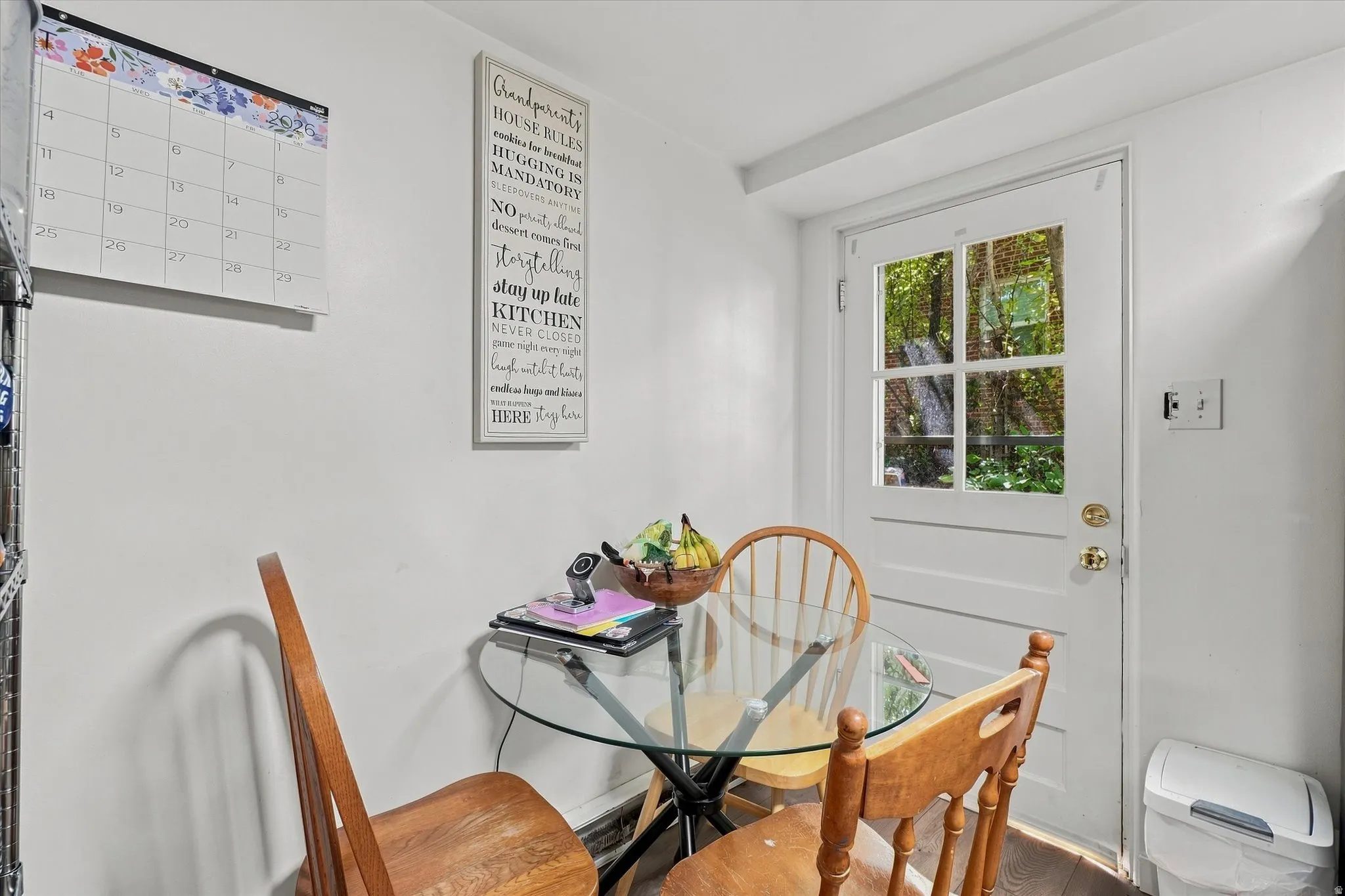 White exterior door with upper window panes