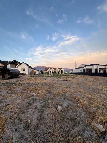 Spacious undeveloped lot offering a prominent setting with distant mountain scenery