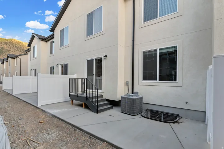 Rear patio with concrete surface