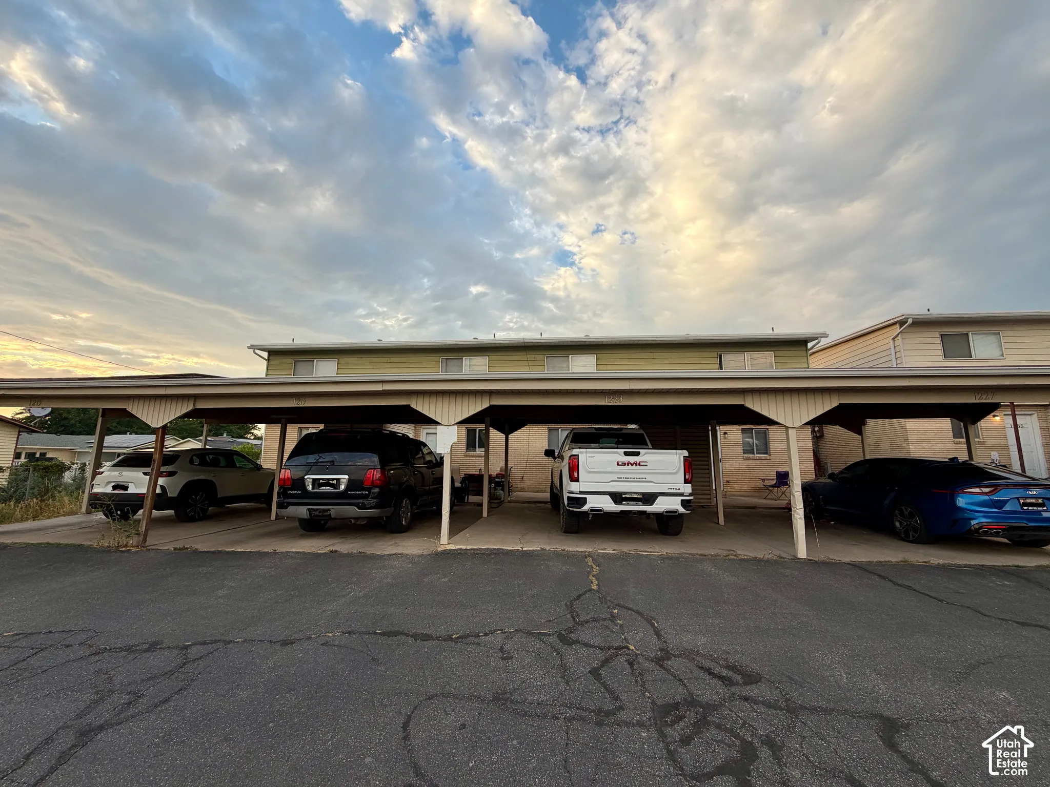 Covered parking structure with individual stalls