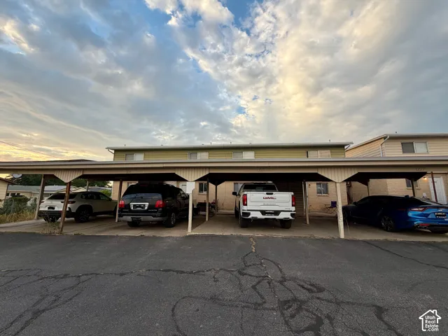 Covered parking structure with individual stalls