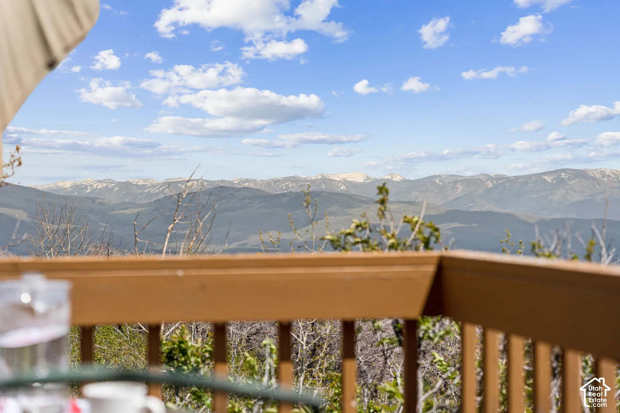 Panoramic Views - Uninterrupted ridgeline views stretching across the horizon from the deck railing.