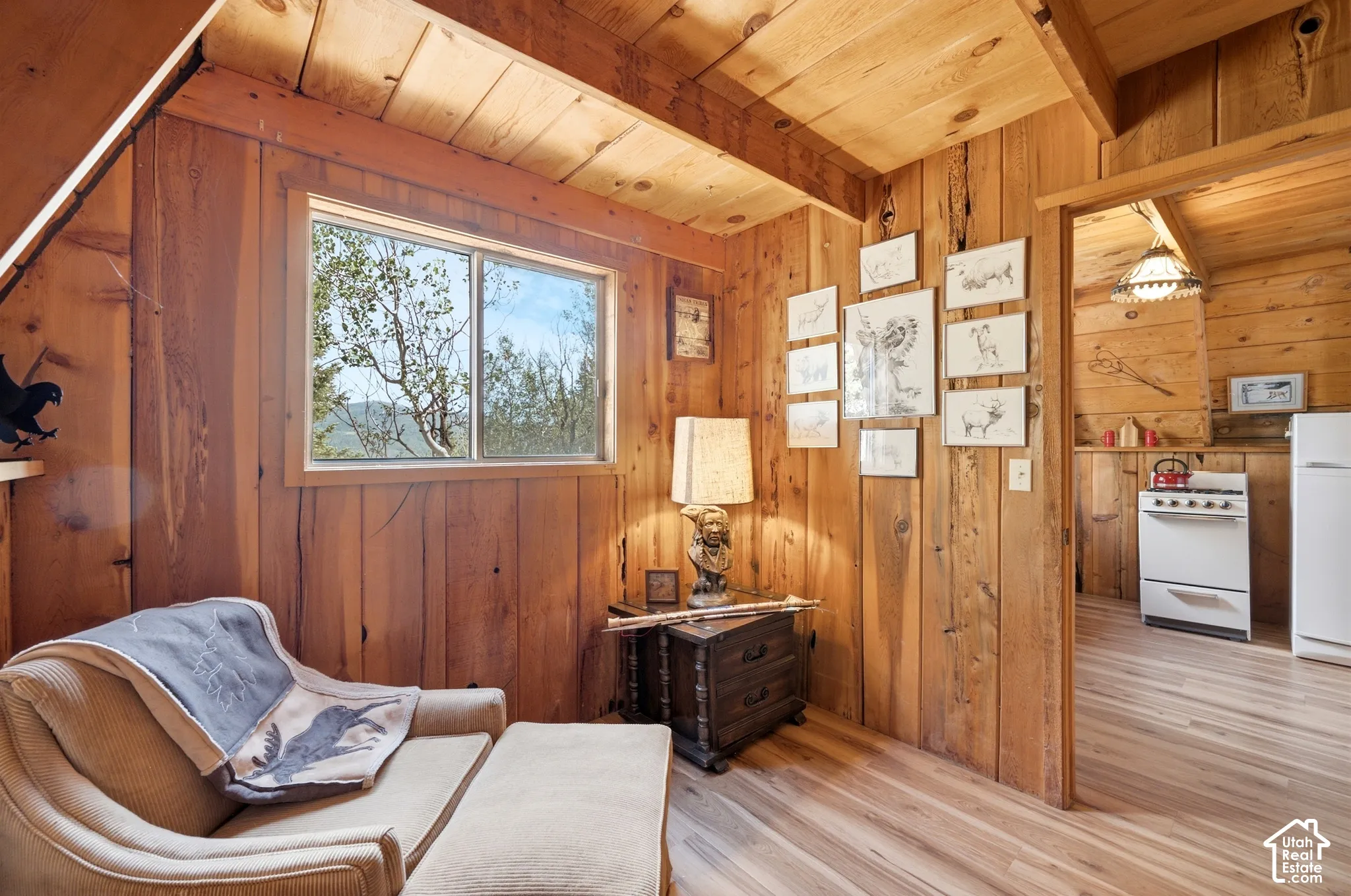 Sitting Room / Flex Space - Flexible room adjoining the kitchen, with natural light from a picture window and space for reading or overflow seating.
