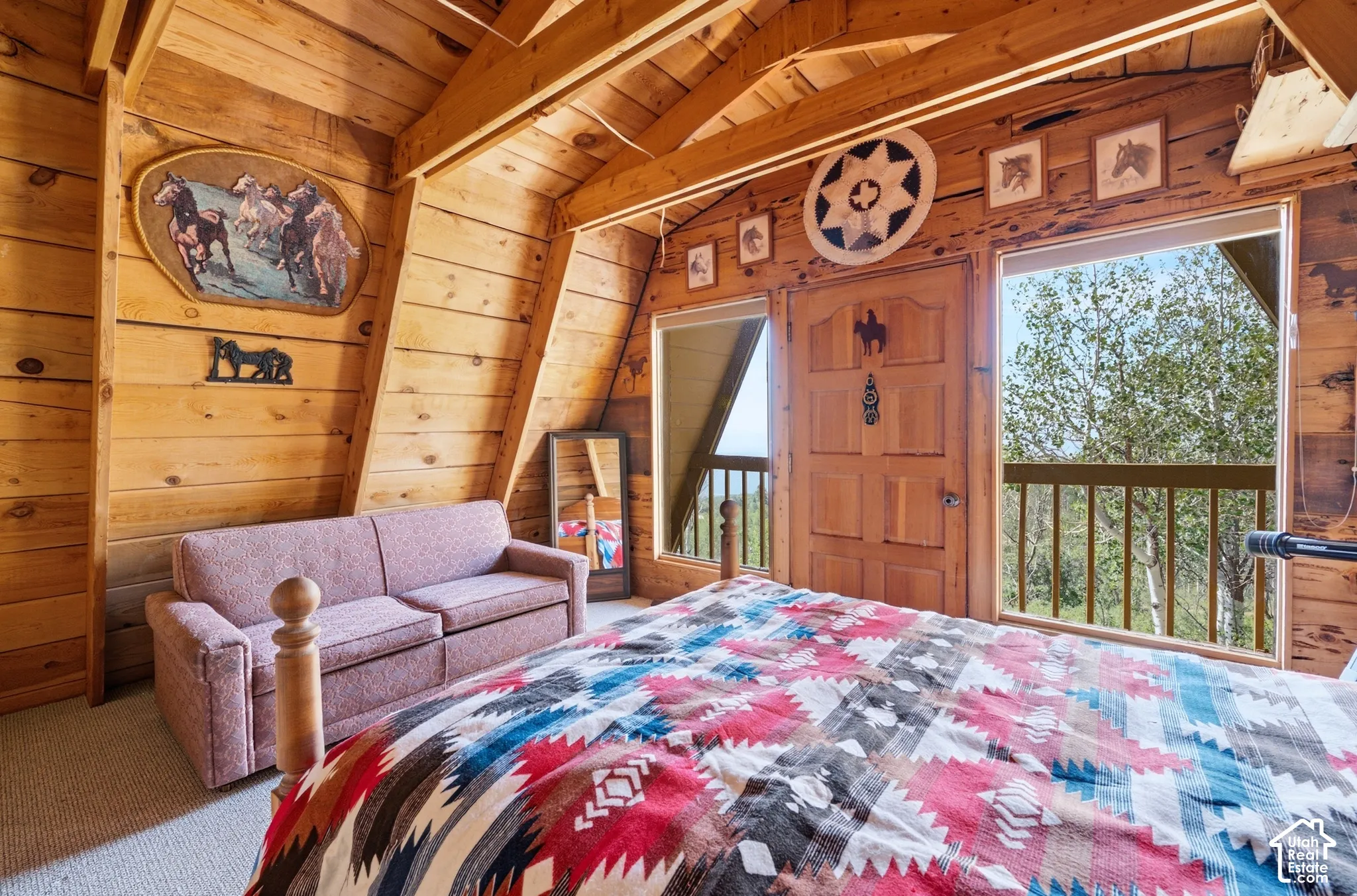 Primary Bedroom - Additional view showing the balcony access, large window, and room for a seating area alongside the bed.