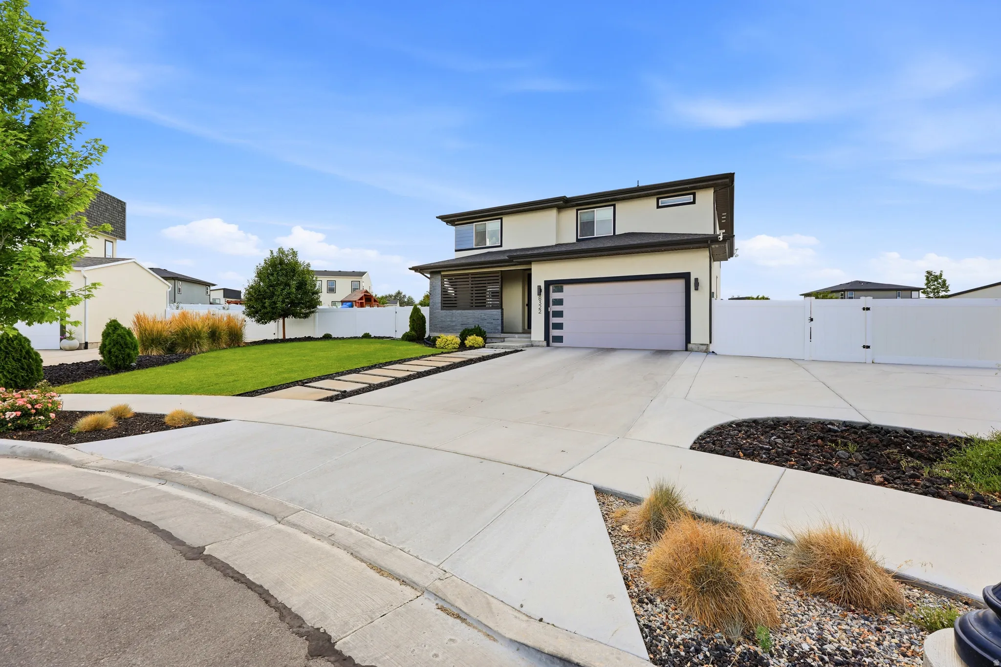 Contemporary two-story exterior with a two-car garage