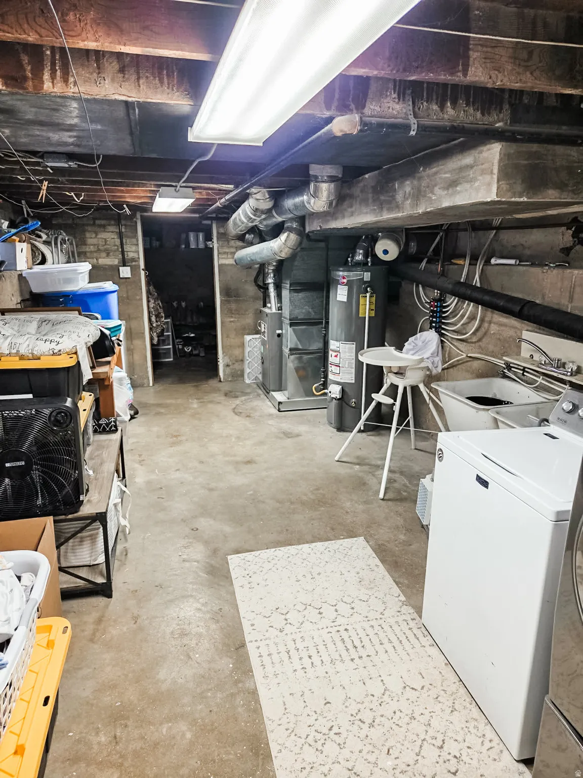 Unfinished basement with lots of storage space