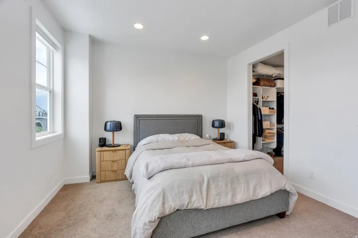 Carpeted bedroom featuring recessed lighting and white walls