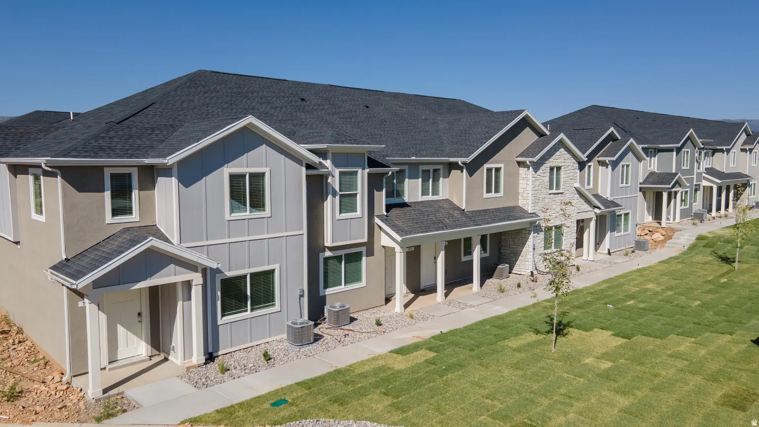 Contemporary townhome architecture featuring varied facade treatments