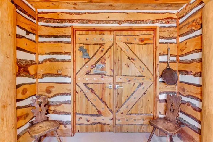Custom double barn doors with rustic wood and metal accents