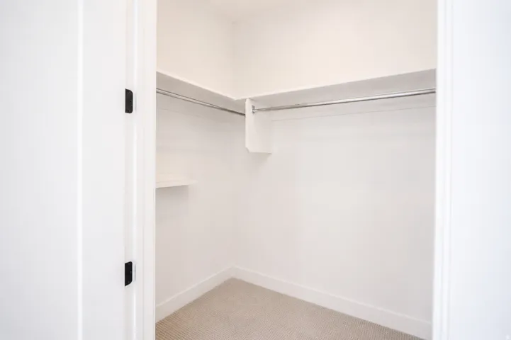 White painted interior with light carpet flooring