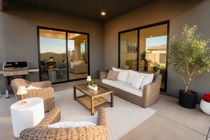 Covered patio with concrete flooring, recessed lighting, and multiple sliding glass doors