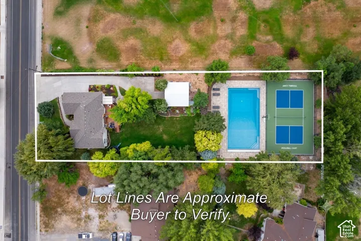 Ample space for a pool and/or pickleball court!