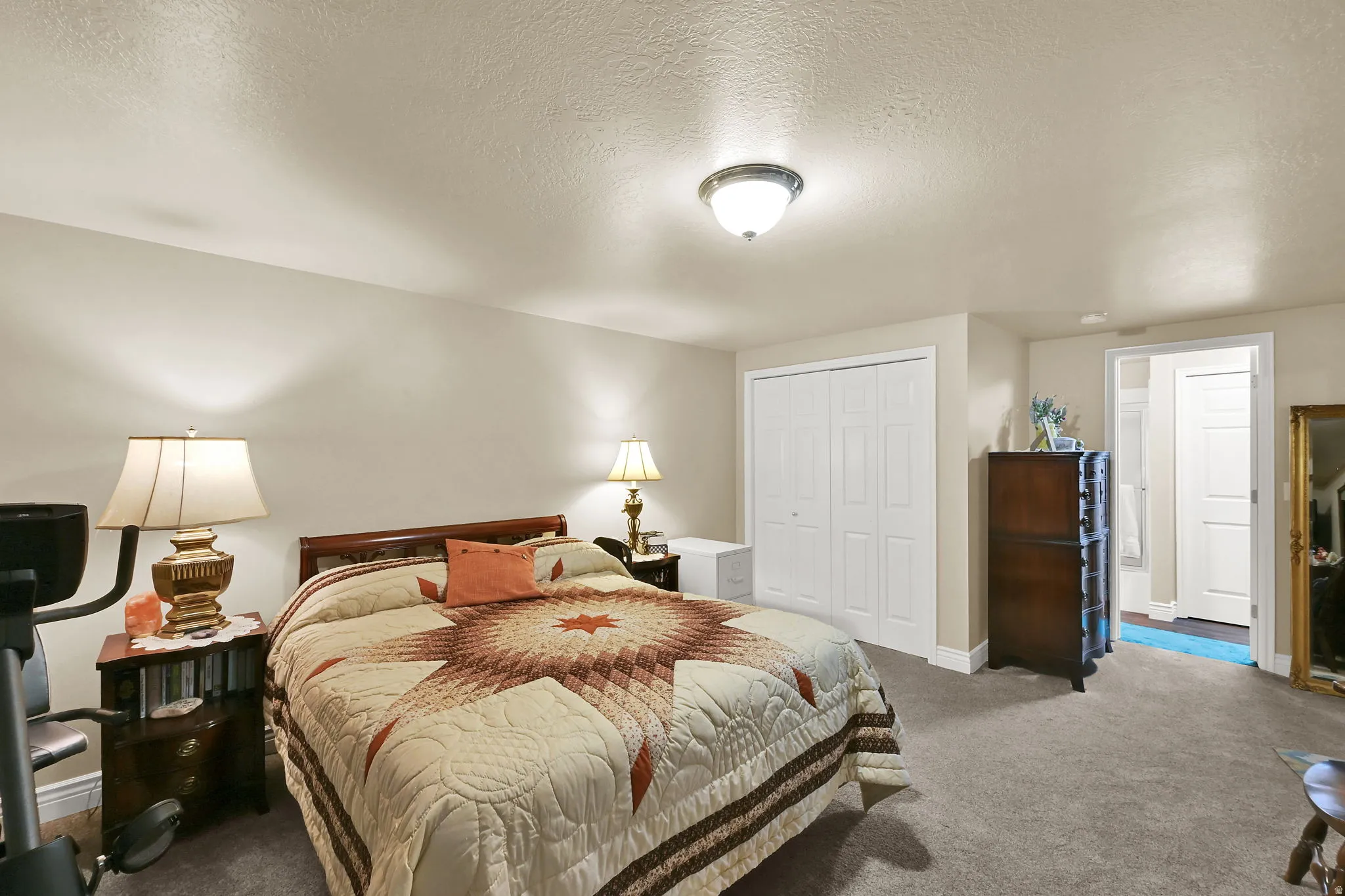Carpeted room with neutral-toned walls