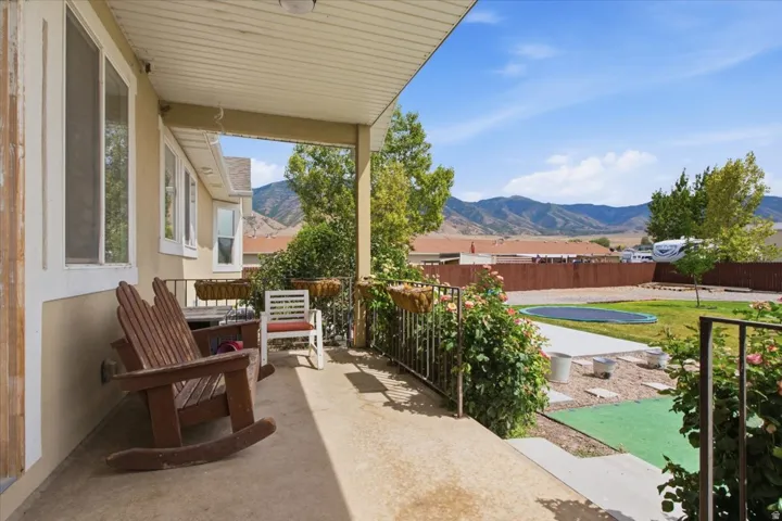 Covered front porch with stucco exterior