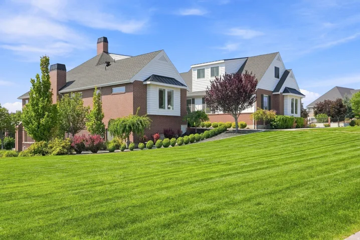 Expansive green lawn with a gentle slope