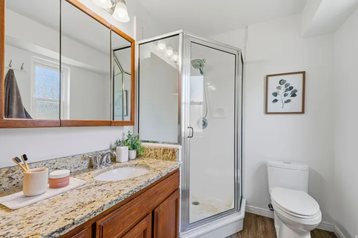 Bedroom #1 ensuite bath has extra storage cabinets.