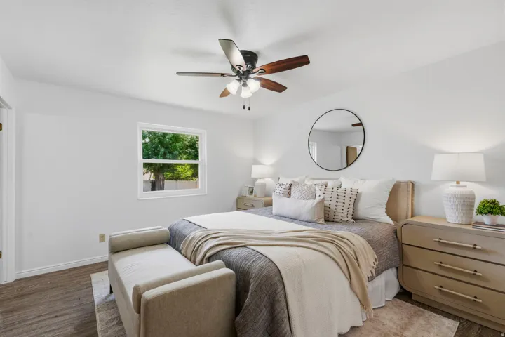 Main level, bedroom #1 with backyard view.