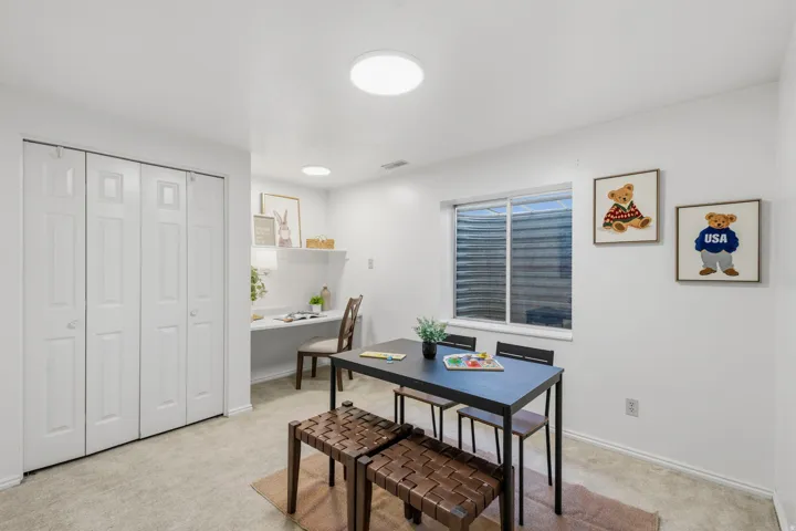 Lower level, bedroom #4 with built-in desk area. Versatile room may be second home office, work-out room, kid's playroom, reading or music room.