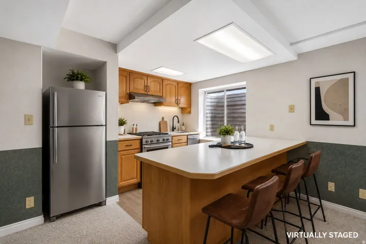Kitchenette may be easily converted to a second, lower level, full kitchen. (photo is ai generated)