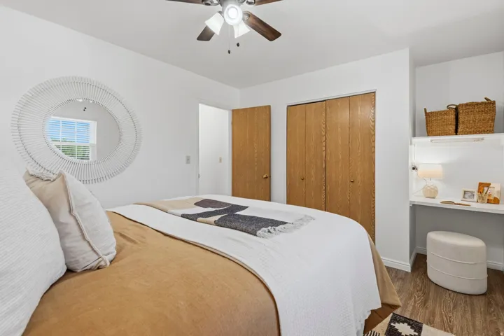 Main level, bedroom #2 with functional built-in desk area.