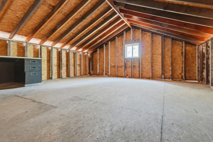 Loft area of the barn with desk area.