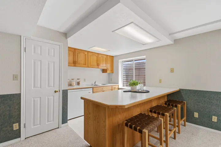 Lower level, wet bar / kitchenette area.