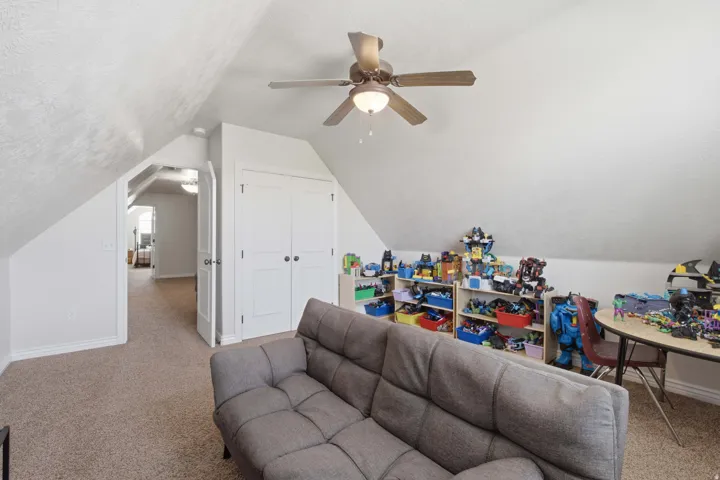 Carpeted flooring with sloped ceilings