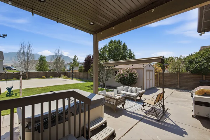 Covered patio featuring an expansive concrete surface