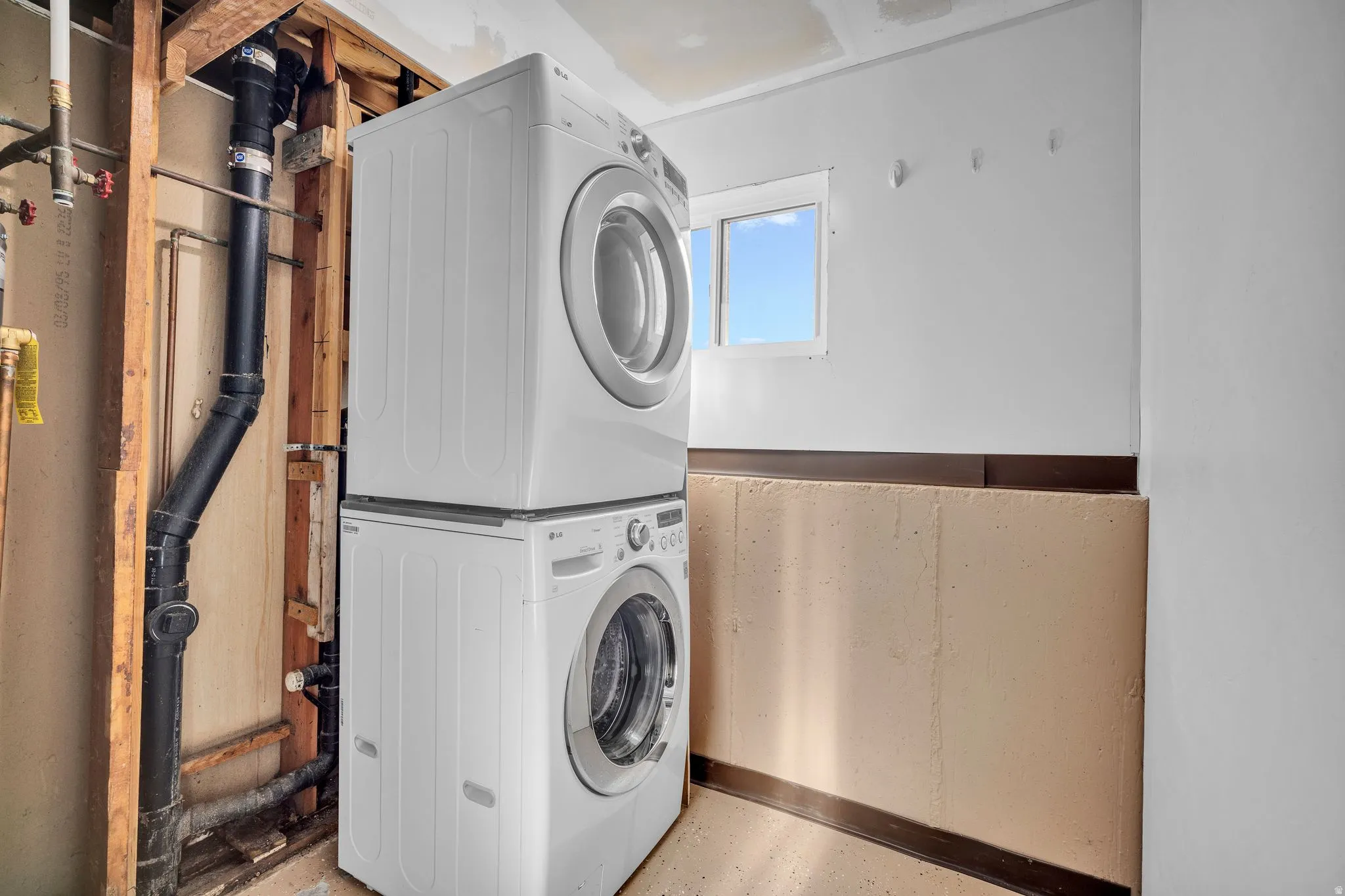 Stackable washer and dryer units featuring a front-loading design