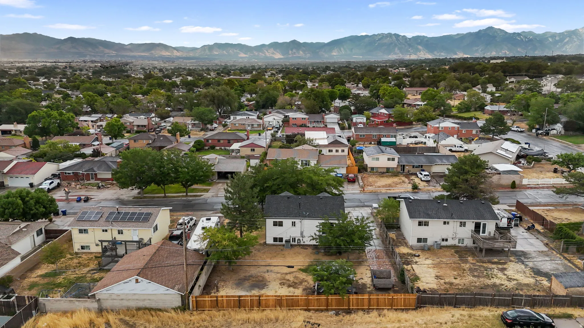 Expansive residential neighborhood with distant mountain scenery