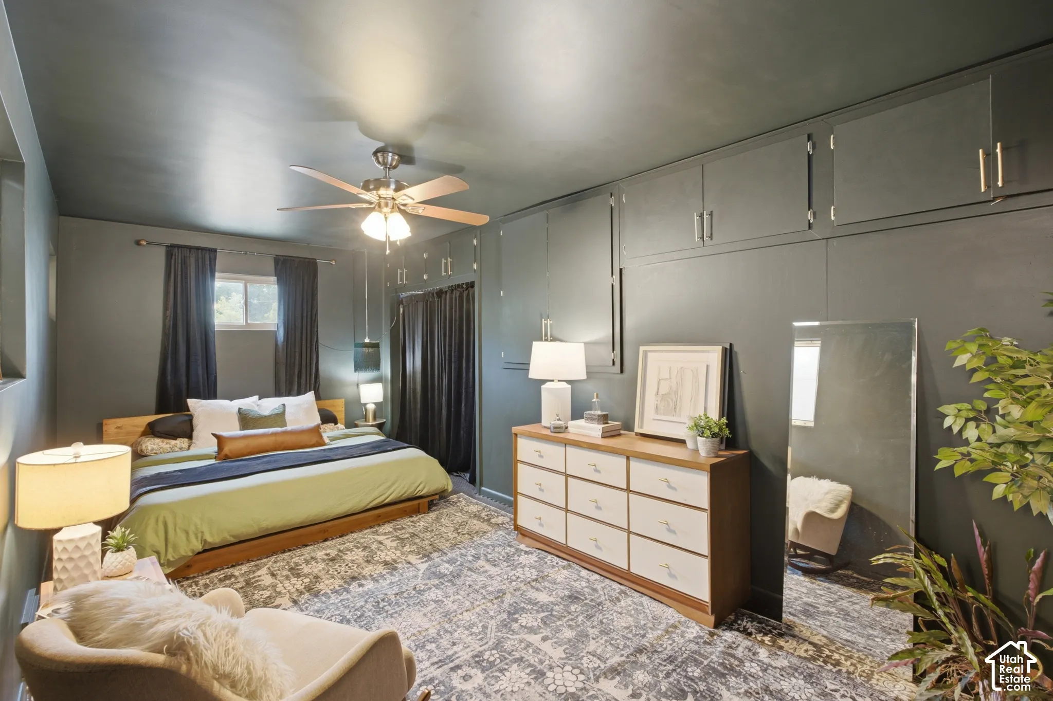 Large primary bedroom with plenty of space for storage.