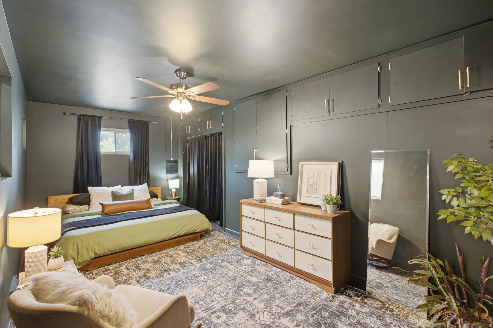 Large primary bedroom with plenty of space for storage.