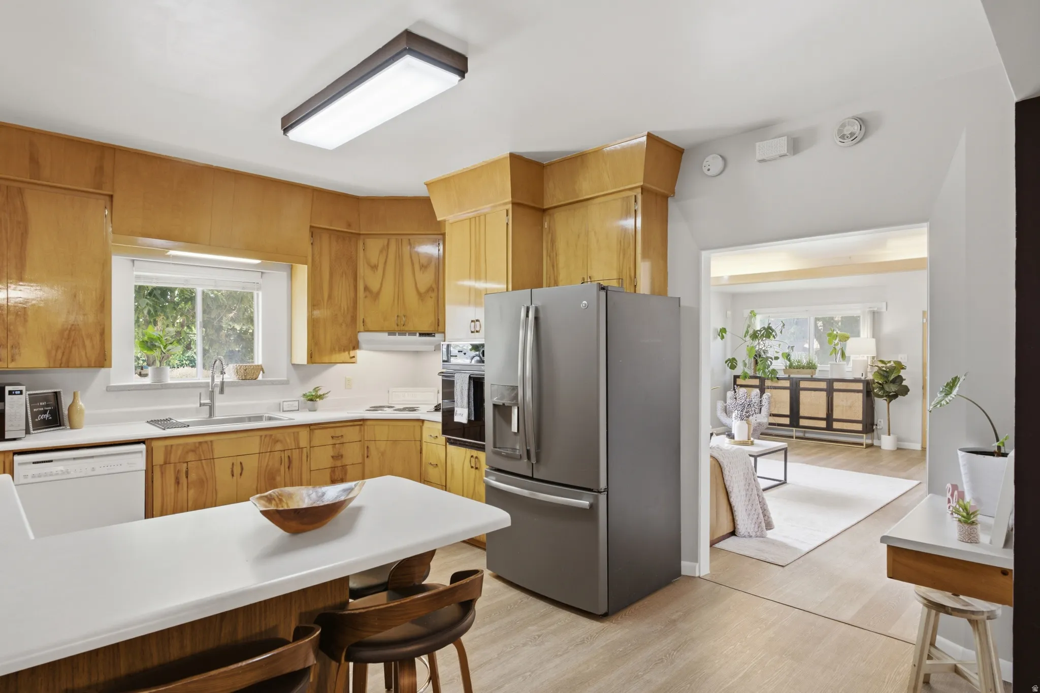 Kitchen window over the sink allows for a view of the large acre lot and allows plenty of natural light.