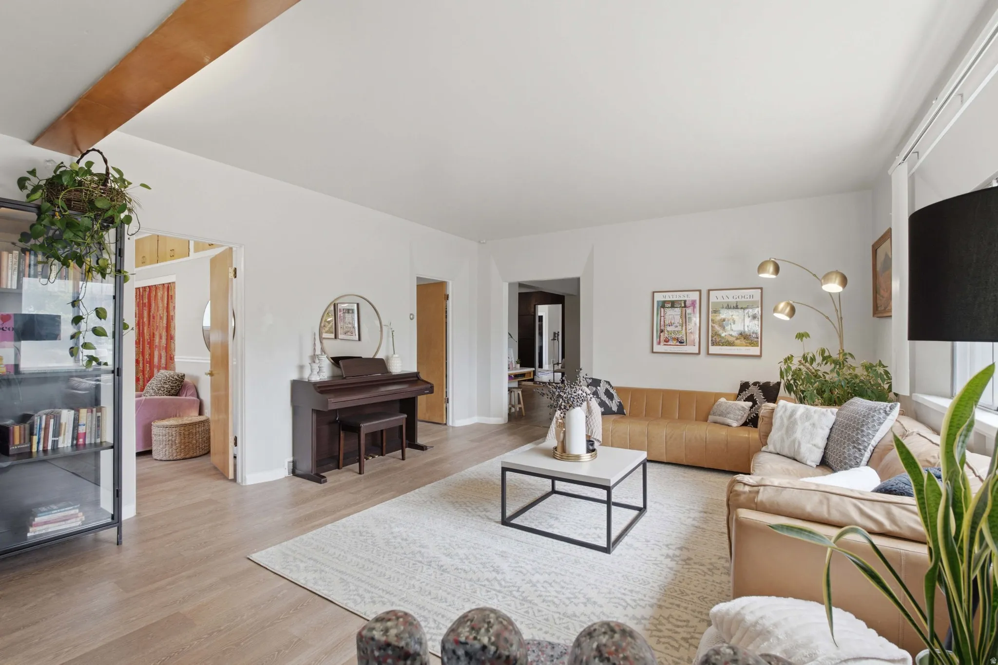 Sizable living room gives an airy and inviting atmosphere.