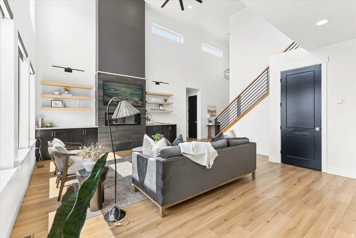 Open concept living space featuring wood-finish flooring