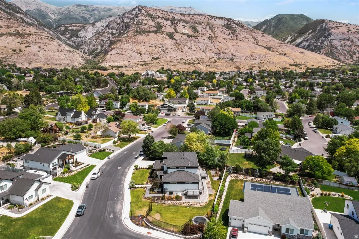 Scenic foothill community featuring established residential neighborhood with mature landscaping, tree-lined streets, and custom homes