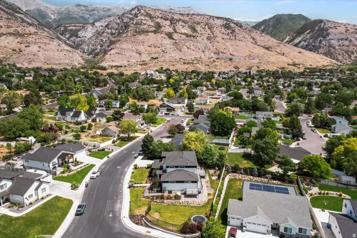 Scenic foothill community featuring established residential neighborhood with mature landscaping, tree-lined streets, and custom homes