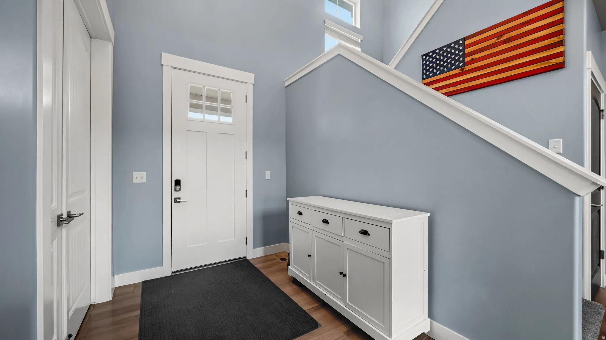 Entryway of home with home office off the entrance.