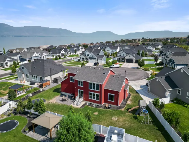 Lakeside community setting with mountain backdrop