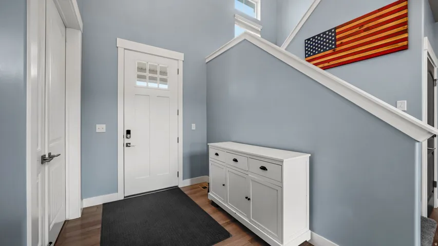 Entryway of home with home office off the entrance.