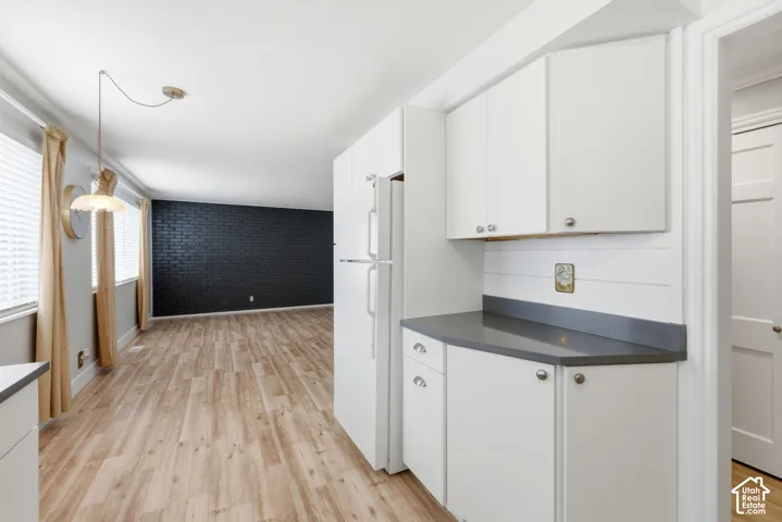 View of open concept kitchen and living area.