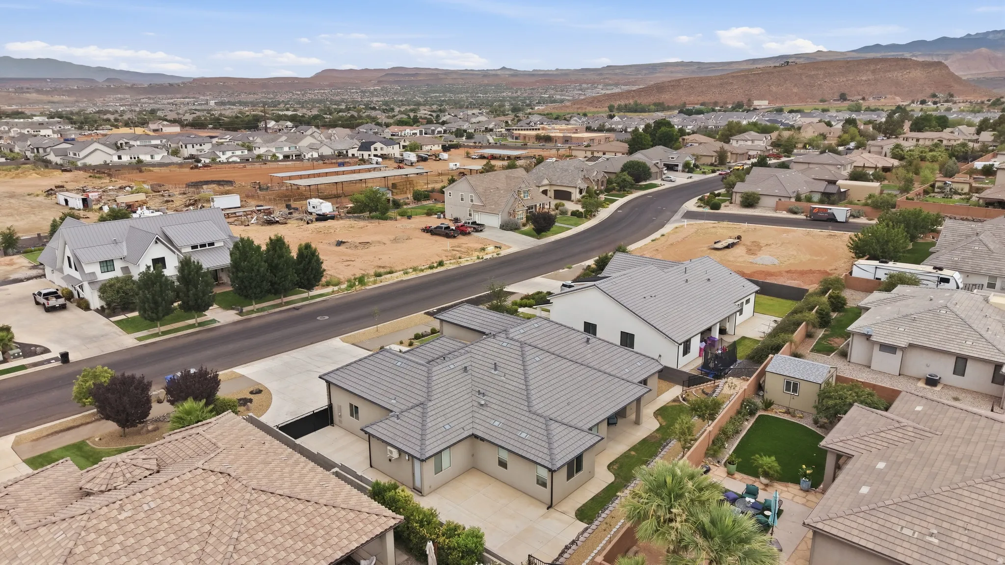 Aerial perspective showcasing residential properties within a developed neighborhood