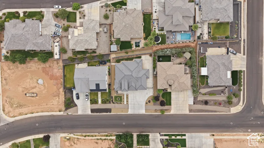 Residential neighborhood featuring multiple single-family homes, paved streets, and varied lot sizes